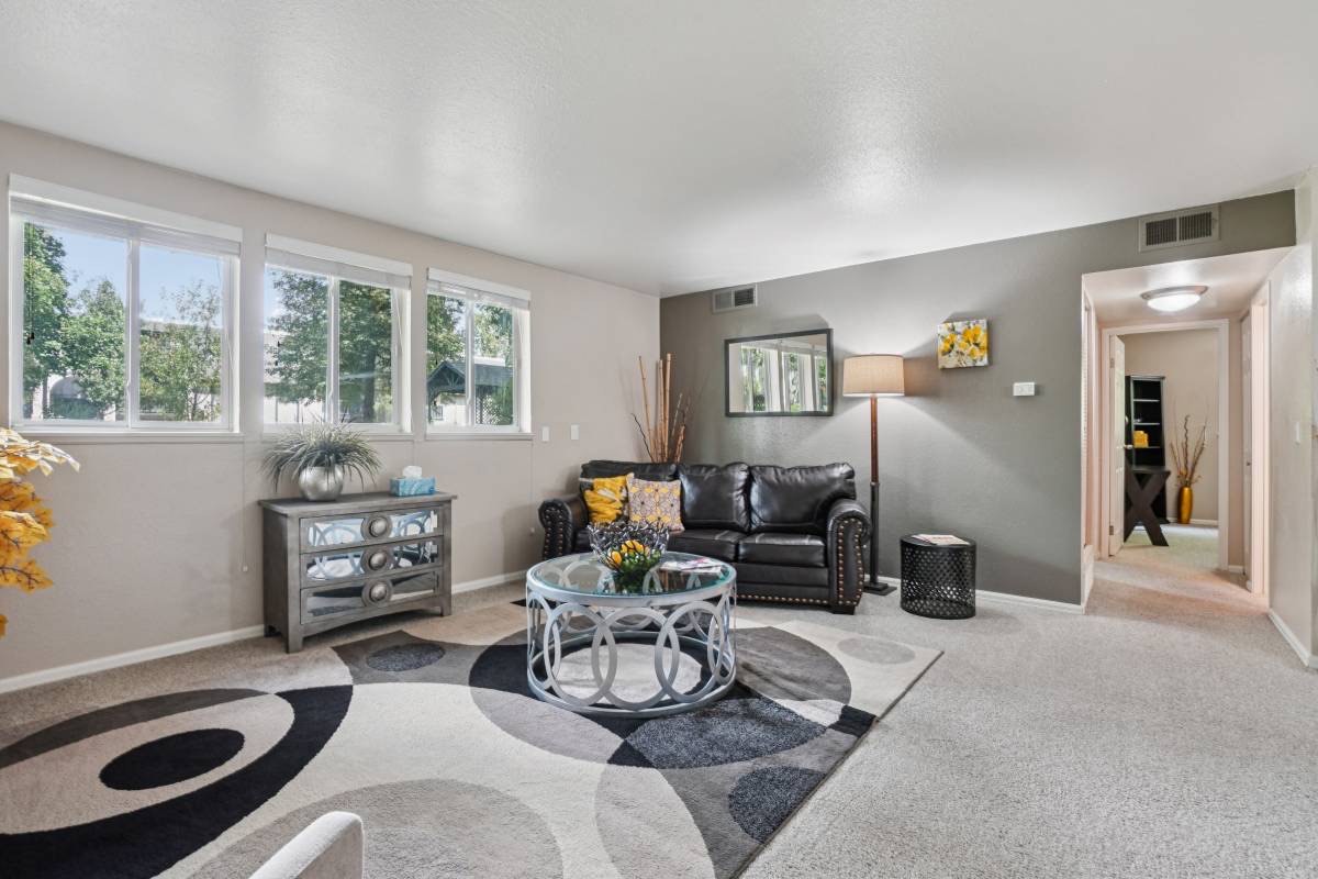 Furnished living area in a renovated Aspenleaf apartment